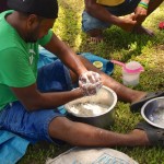 Knox preparing coconut milk