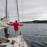 Bruno doing a Lebowski-pose on the foredeck (Tai Chi)
